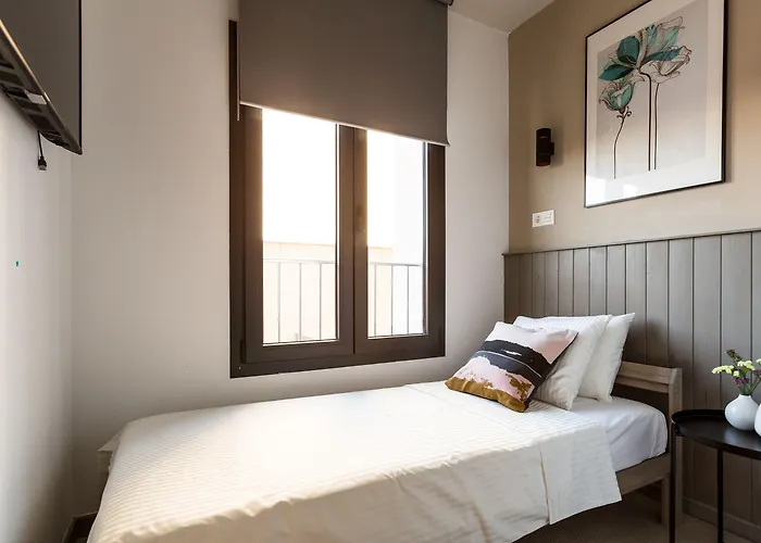 Hostal12 מלון אל קאמפיו